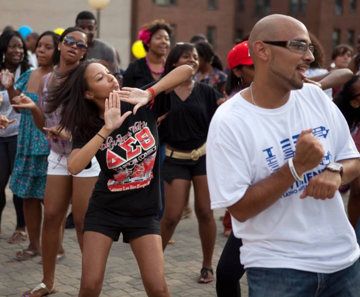 Students dance on the terrace of the Marvin Center.