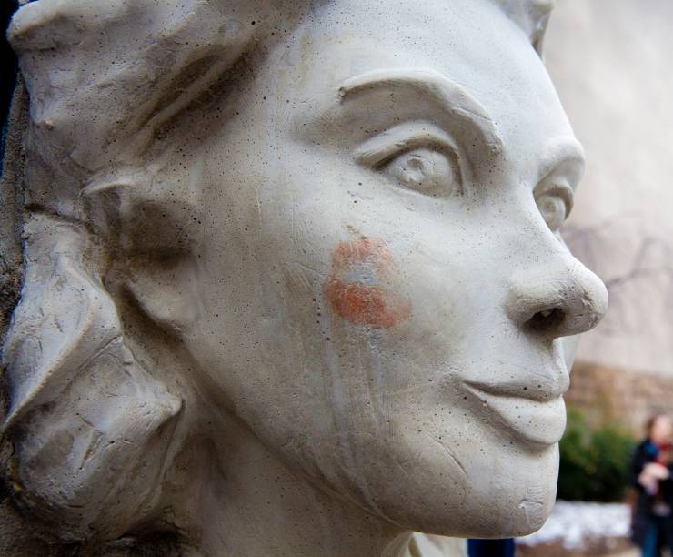 A white sculpture of Ingrid Bergman's face sits outside Lisner Auditorium.