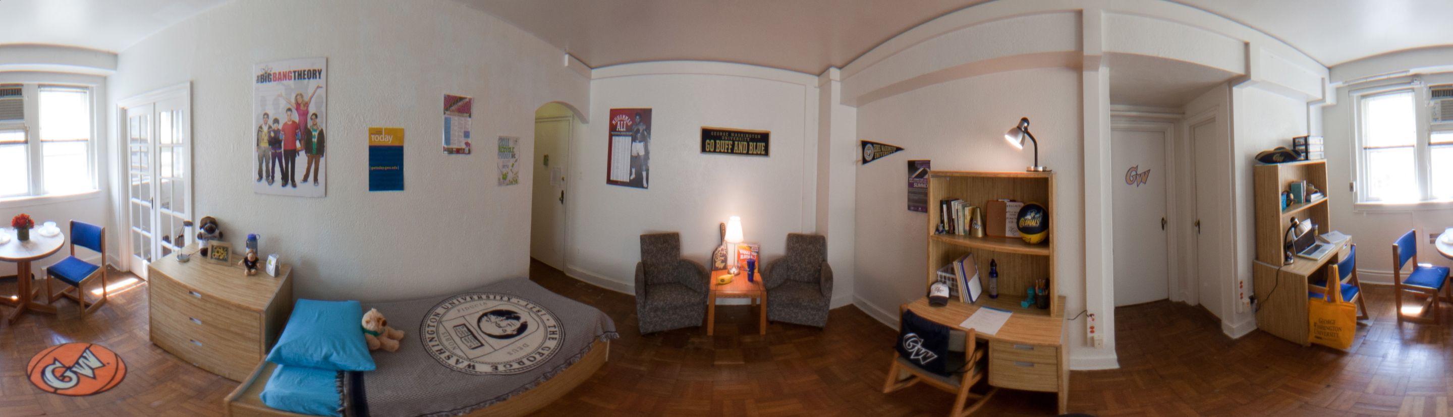 A panoramic view of a residence hall room.
