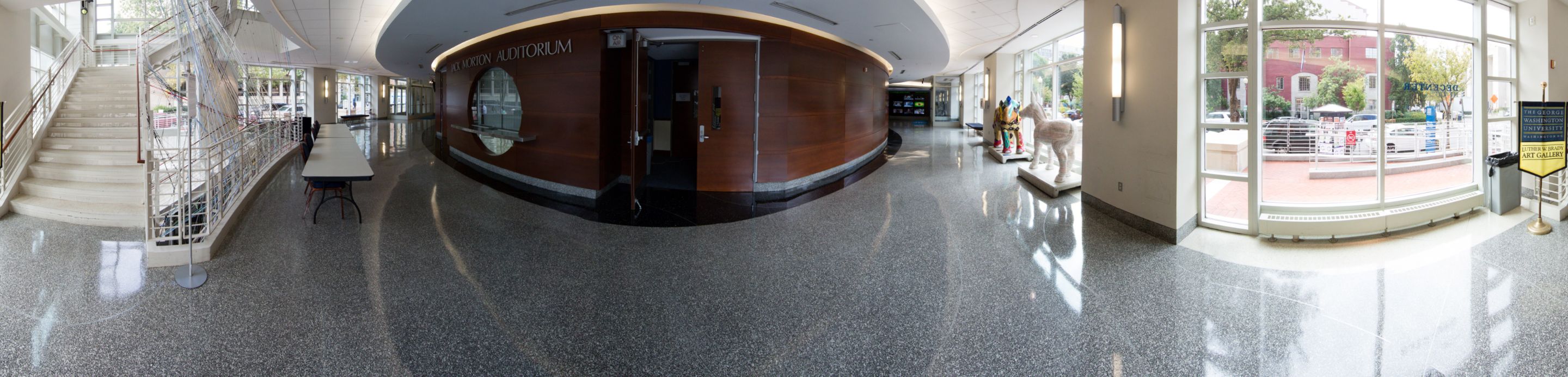 A panoramic shot of the lobby of the Media and Public Affairs Building, with entrance to the Jack Morton Auditorium.