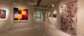 A panoramic view of a painting exhibition.