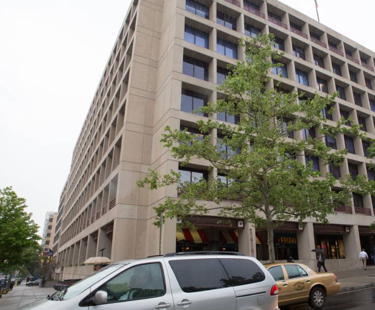 Corner shot of 2100 Pennsylvania Avenue with two green trees
